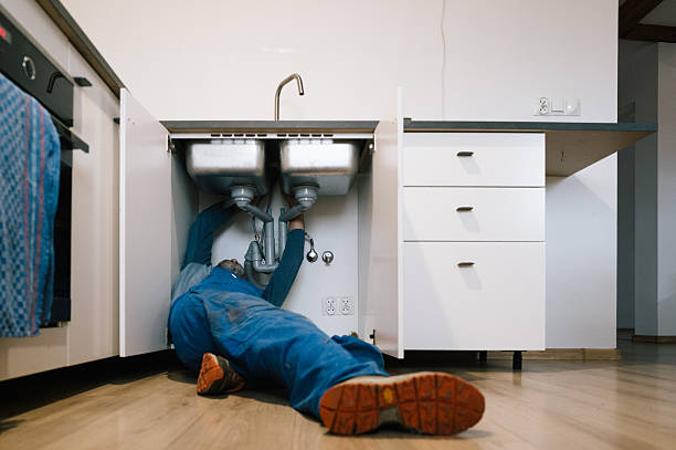 Professional Emergency Plumber technician working in Hartwick, NY